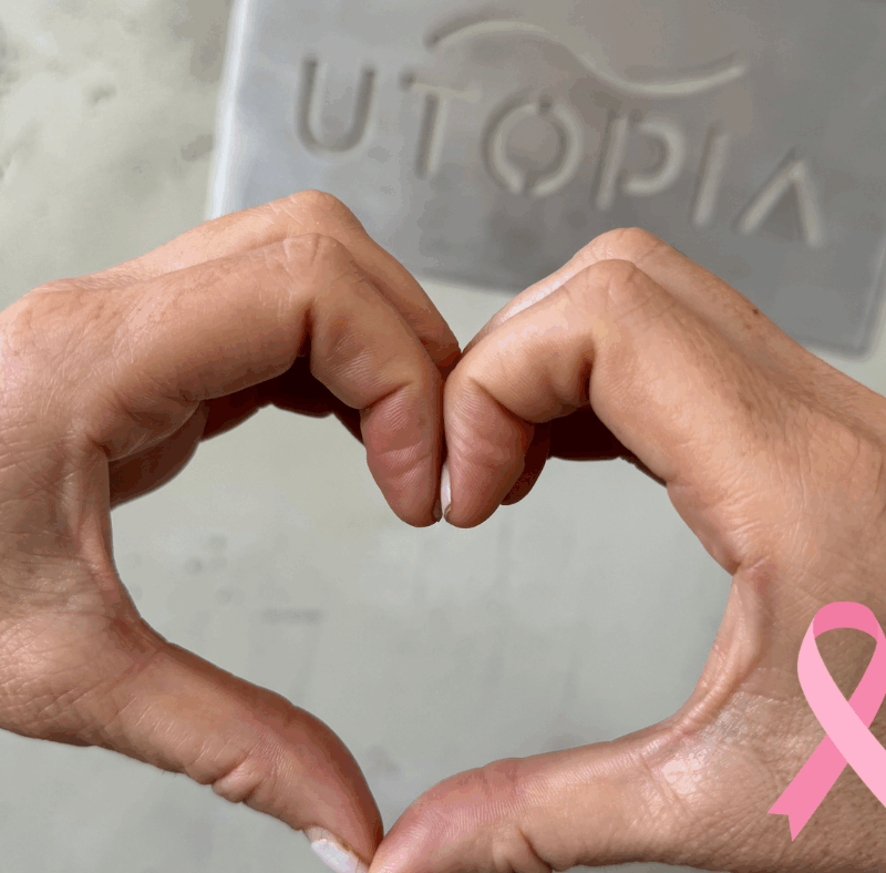 Heart sign in front of Utopia sign.